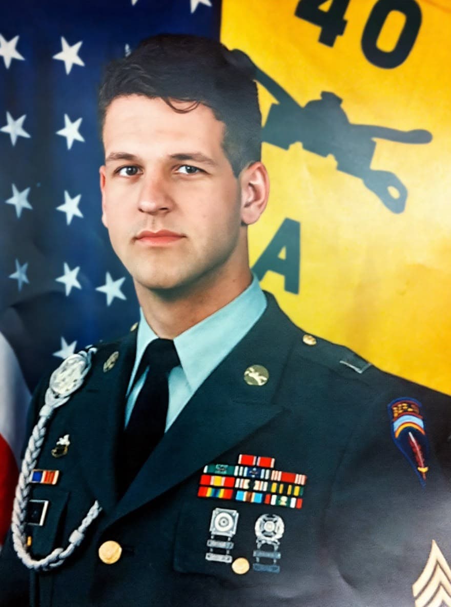 Steven Kuhn in U.S. Army dress uniform with a fellow serviceman