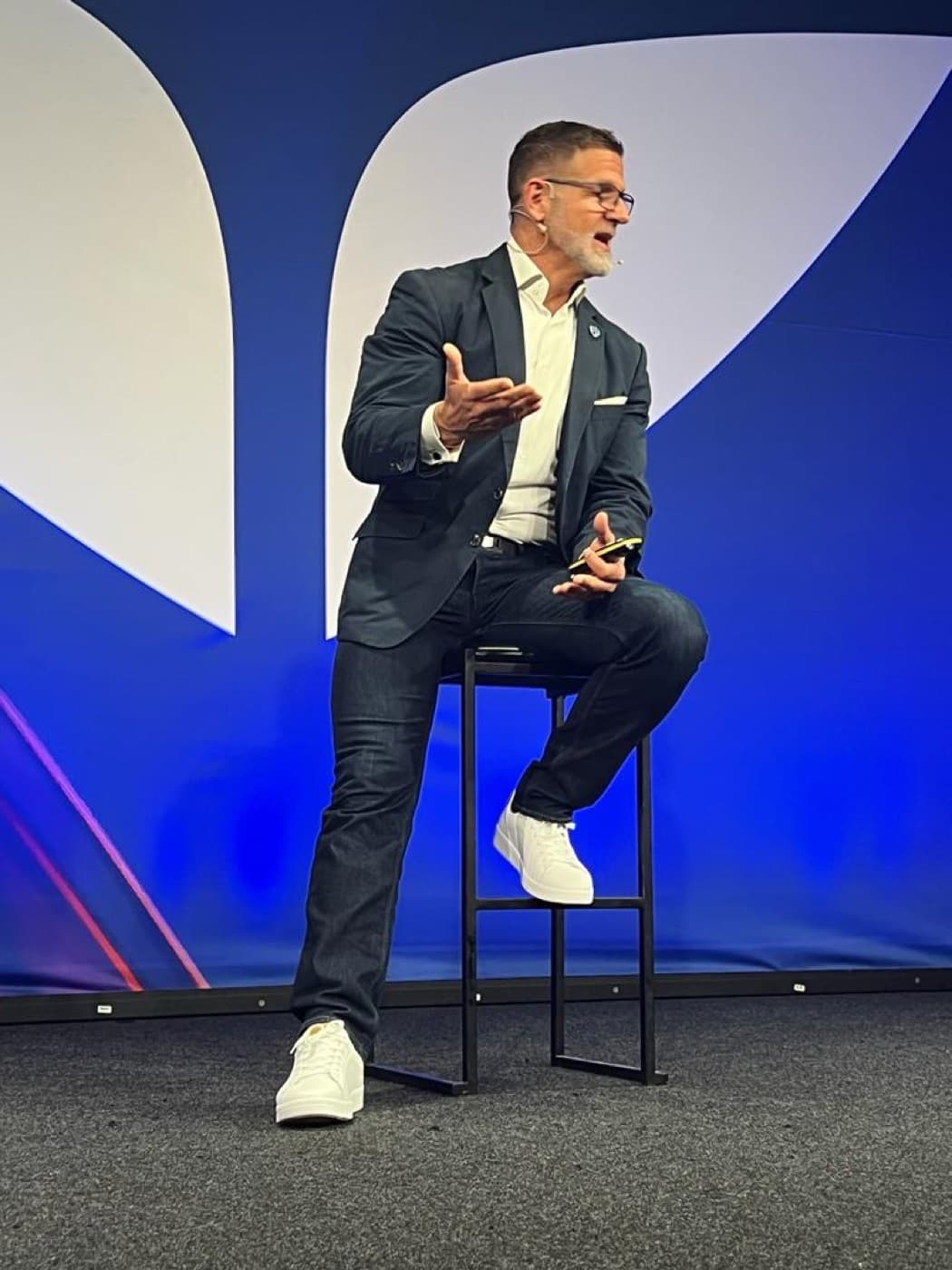 Steven Eugene Kuhn speaking on stage